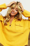 Woman wearing Honey Mustard Fleece Collared Sweatshirt-Fleece collared sweatshirt with flap pockets and button details. Cozy, stylish, and perfect for layering all season long, your new cozy fall favorite.