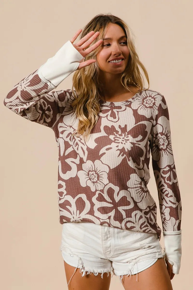 Shop Flower Printed Waffle Thumb Opening Top-Cozy and casual, flower printed waffle knit top features thumb openings, a classic crew neck, and a relaxed fit. Ideal for layering during transitional seasons.-Reef Love Boho-Chic Boutique
