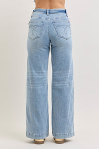 Judy Blue light wash mid-rise retro wide leg jeans with a fold-over waistband and stylish pocket stitching.