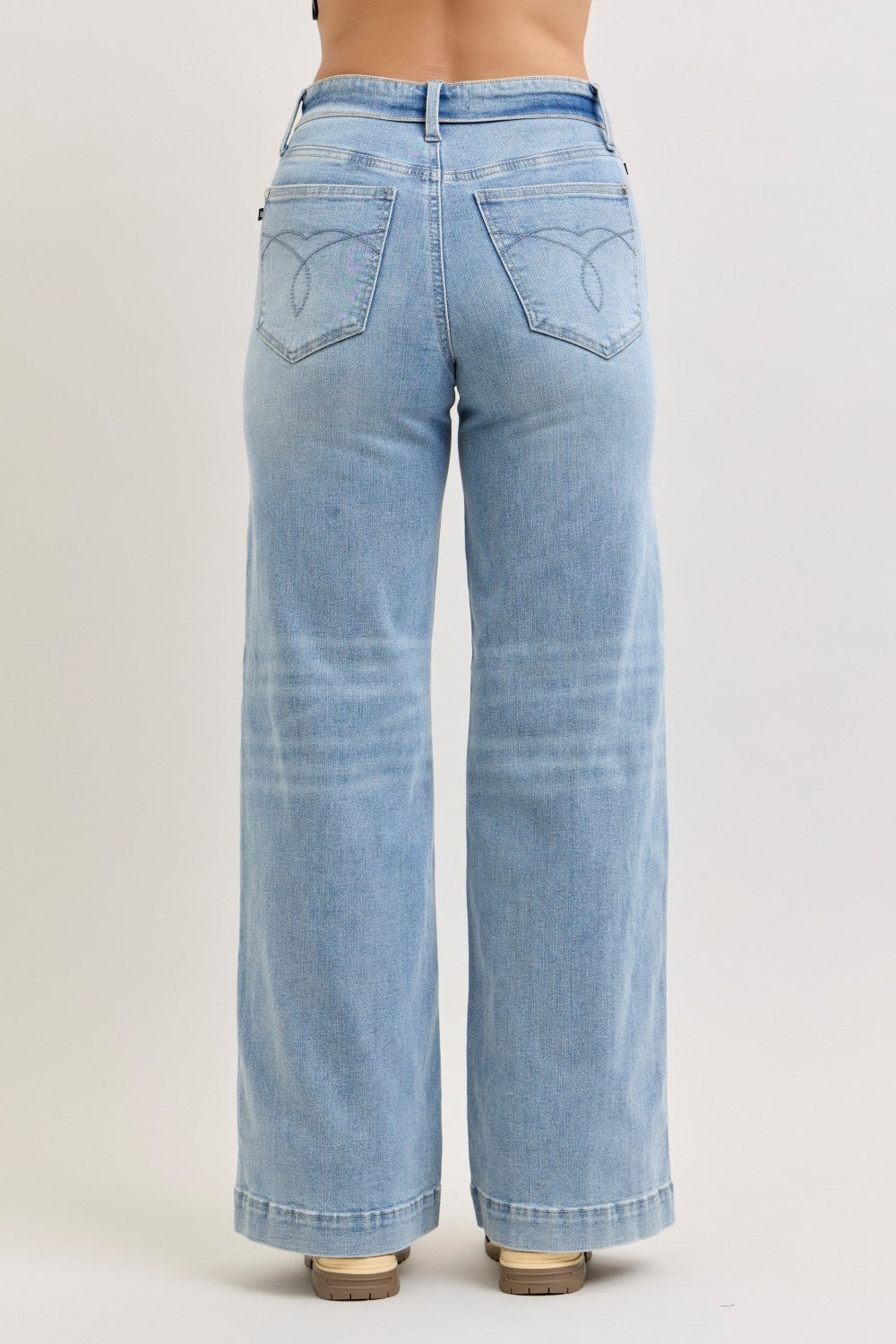 Judy Blue light wash mid-rise retro wide leg jeans with a fold-over waistband and stylish pocket stitching.