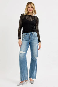 Woman wearing Relaxed Fit Wide Baggy Leg Washed Jeans-Mid-rise relaxed fit, wide baggy leg jeans feature a tie-washed design, slightly distressed for a cool and edgy aesthetic - for creating a casual trendy outfit.