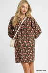 Woman wearing Fall Floral Tie-Neck Babydoll Dress-Fall floral tie-neck babydoll dress is a charming choice for any occasion. The tie-neck detail adds a touch of elegance to the sweet babydoll silhouette.