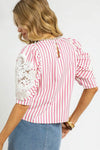 Shop Pink + White Striped Lace Puff Sleeve Blouse-Add a coastal twist to your wardrobe with this pink and white striped puff sleeve blouse. Features a cropped fit, oversized bow detail, breathable 100% cotton.-available at Reef Love online boho-chic boutique
