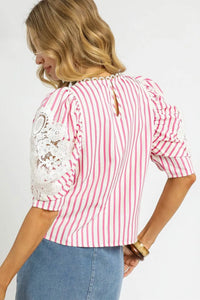 Shop Pink + White Striped Lace Puff Sleeve Blouse-Add a coastal twist to your wardrobe with this pink and white striped puff sleeve blouse. Features a cropped fit, oversized bow detail, breathable 100% cotton.-available at Reef Love online boho-chic boutique