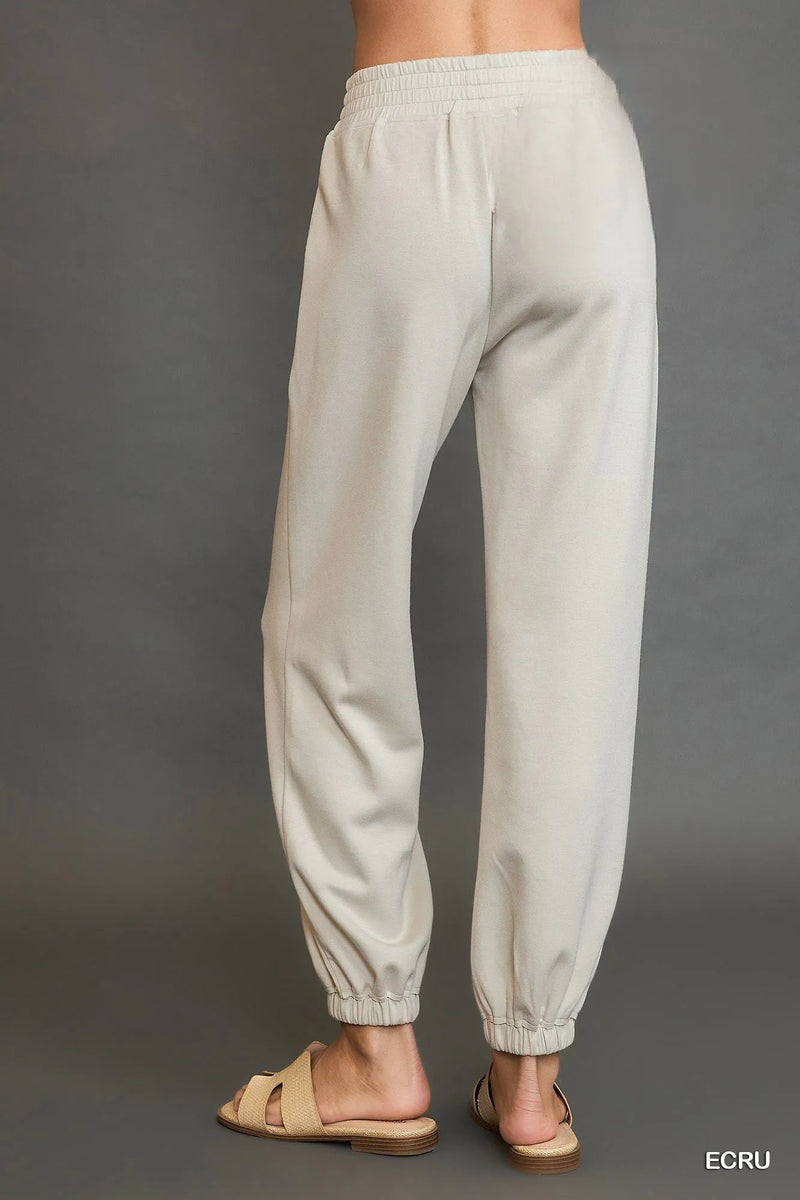 Drawstring Jogger Pants with Front Seam Detail-Women's Drawstring Jogger Pants with Front Seam Detail – Perfect mix of Comfort with a Modern Style. Made from a soft, stretchy fabric blend.-Reef Love Boutique