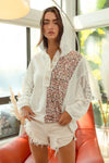 Woman wearing Slub Jersey with Lace Combo Buttoned Hoodie Top-This slub jersey with lace combo buttoned hoodie top blends casual comfort with feminine elegance through its lace detailing and buttoned hoodie design. 