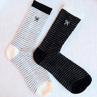 A Bow Over Stripes Socks, Pack of 2-A Bow Over Stripes Socks, Pack of 2. These lovely socks feature a stylish bow design paired with modern stripes, making them a must-have accessory. 
