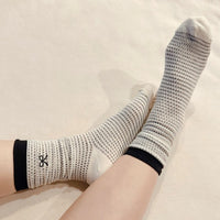 A Bow Over Stripes Socks, Pack of 2-A Bow Over Stripes Socks, Pack of 2. These lovely socks feature a stylish bow design paired with modern stripes, making them a must-have accessory. 