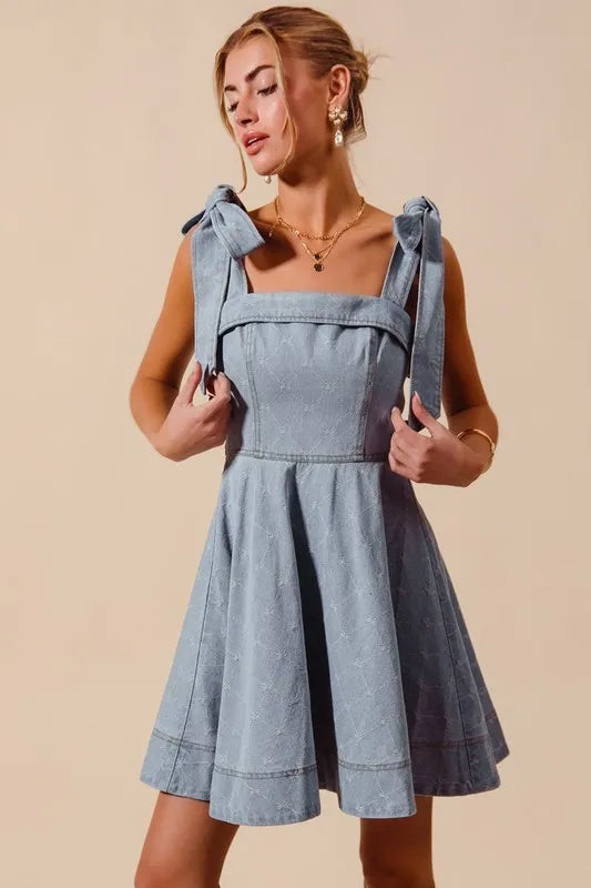 A Line Fit and Flare Diamond Bow Ribbon Denim Dres-This A-line fit and flare diamond bow ribbon denim dress is a charming and stylish choice for a variety of occasions. The fit and flare silhouette is flattering and versatile-Reef Love Boho-Chic Boutique