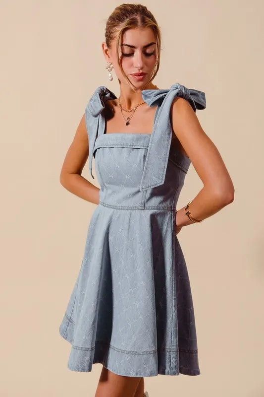 A Line Fit and Flare Diamond Bow Ribbon Denim Dres-This A-line fit and flare diamond bow ribbon denim dress is a charming and stylish choice for a variety of occasions. The fit and flare silhouette is flattering and versatile-Reef Love Boho-Chic Boutique