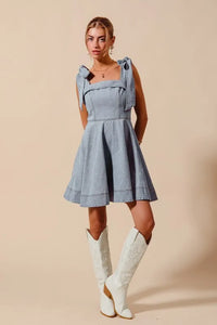 A Line Fit and Flare Diamond Bow Ribbon Denim Dres-This A-line fit and flare diamond bow ribbon denim dress is a charming and stylish choice for a variety of occasions. The fit and flare silhouette is flattering and versatile-Reef Love Boho-Chic Boutique