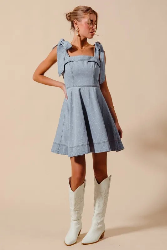 A Line Fit and Flare Diamond Bow Ribbon Denim Dres-This A-line fit and flare diamond bow ribbon denim dress is a charming and stylish choice for a variety of occasions. The fit and flare silhouette is flattering and versatile-Reef Love Boho-Chic Boutique