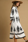 Abstract Medallion Print Midi Dress-Turn heads with this abstract medallion print midi dress featuring a modern black-on-off-white design, soft stretch fabric, and versatile styling for any occasion.-Reef Love Boho-Chic Boutique