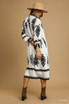 Abstract Medallion Print Midi Dress-Turn heads with this abstract medallion print midi dress featuring a modern black-on-off-white design, soft stretch fabric, and versatile styling for any occasion.-Reef Love Boho-Chic Boutique