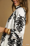 Abstract Medallion Print Midi Dress-Turn heads with this abstract medallion print midi dress featuring a modern black-on-off-white design, soft stretch fabric, and versatile styling for any occasion.-Reef Love Boho-Chic Boutique