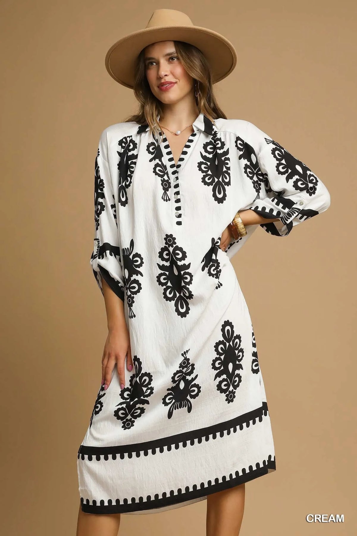 Abstract Medallion Print Midi Dress-Turn heads with this abstract medallion print midi dress featuring a modern black-on-off-white design, soft stretch fabric, and versatile styling for any occasion.-Reef Love Boho-Chic Boutique