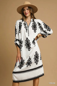 Abstract Medallion Print Midi Dress-Turn heads with this abstract medallion print midi dress featuring a modern black-on-off-white design, soft stretch fabric, and versatile styling for any occasion.-Reef Love Boho-Chic Boutique