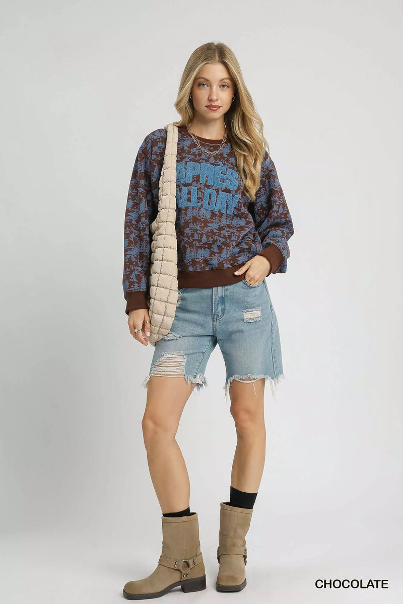 Après All Day Cropped Sweatshirt, Chocolate-The Après All Day print cropped sweatshirt is a trendy and cozy piece for your casual outfits or fun top for a winter ski weekend. 