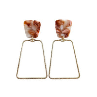 Shop Ariana Earrings - Rust-Ariana Earrings in rust pair earthy acrylic studs with gold trapezoid charms. Lightweight, hypoallergenic, and bold—perfect for everyday boho-chic styling.-available at Reef Love online boho-chic boutique