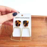 Shop Ariana Earrings - Tortoise-Bold tortoise statement earrings with gold trapezoid charms. Lightweight, hypoallergenic, and perfect for elevating everyday or night-out looks.-available at Reef Love online boho-chic boutique
