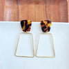 Shop Ariana Earrings - Tortoise-Bold tortoise statement earrings with gold trapezoid charms. Lightweight, hypoallergenic, and perfect for elevating everyday or night-out looks.-available at Reef Love online boho-chic boutique
