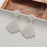 Shop Ariel Earrings - Seashell-Scalloped seashell acrylic earrings with hypoallergenic posts. Lightweight and beachy-chic—perfect for summer days, nights out, or mermaid-inspired style.-available at Reef Love online boho-chic boutique