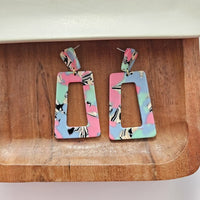 Shop Avery Drop Earrings - 80's Pastel-Avery 80’s Pastel Drop Earrings with pink, blue, and zebra print confetti. Lightweight, retro-inspired fun for bold looks and nostalgic style moments.-available at Reef Love online boho-chic boutique