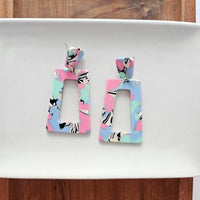 Shop Avery Drop Earrings - 80's Pastel-Avery 80’s Pastel Drop Earrings with pink, blue, and zebra print confetti. Lightweight, retro-inspired fun for bold looks and nostalgic style moments.-available at Reef Love online boho-chic boutique