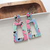 Shop Avery Drop Earrings - 80's Pastel-Avery 80’s Pastel Drop Earrings with pink, blue, and zebra print confetti. Lightweight, retro-inspired fun for bold looks and nostalgic style moments.-available at Reef Love online boho-chic boutique
