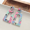 Shop Avery Drop Earrings - 80's Pastel-Avery 80’s Pastel Drop Earrings with pink, blue, and zebra print confetti. Lightweight, retro-inspired fun for bold looks and nostalgic style moments.-available at Reef Love online boho-chic boutique