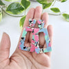 Shop Avery Drop Earrings - 80's Pastel-Avery 80’s Pastel Drop Earrings with pink, blue, and zebra print confetti. Lightweight, retro-inspired fun for bold looks and nostalgic style moments.-available at Reef Love online boho-chic boutique