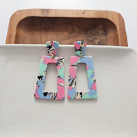 Shop Avery Drop Earrings - 80's Pastel-Avery 80’s Pastel Drop Earrings with pink, blue, and zebra print confetti. Lightweight, retro-inspired fun for bold looks and nostalgic style moments.-available at Reef Love online boho-chic boutique