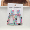 Shop Avery Drop Earrings - 80's Pastel-Avery 80’s Pastel Drop Earrings with pink, blue, and zebra print confetti. Lightweight, retro-inspired fun for bold looks and nostalgic style moments.-available at Reef Love online boho-chic boutique