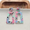Shop Avery Drop Earrings - 80's Pastel-Avery 80’s Pastel Drop Earrings with pink, blue, and zebra print confetti. Lightweight, retro-inspired fun for bold looks and nostalgic style moments.-available at Reef Love online boho-chic boutique