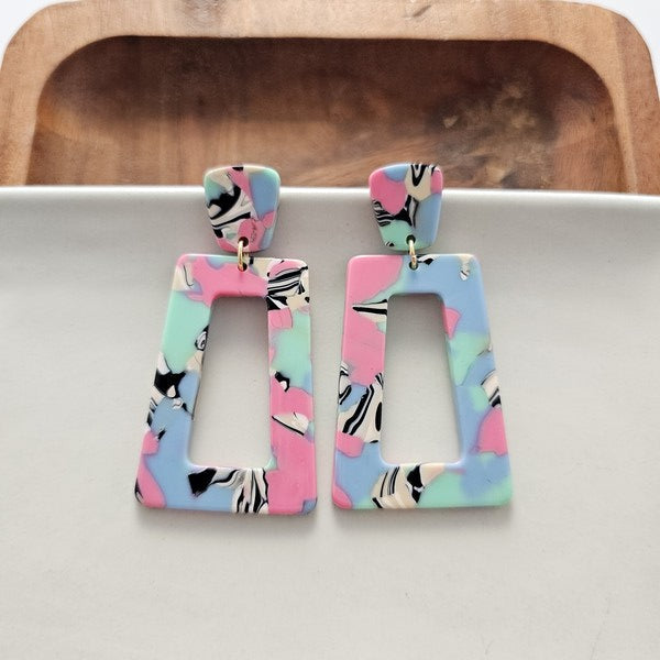 Shop Avery Drop Earrings - 80's Pastel-Avery 80’s Pastel Drop Earrings with pink, blue, and zebra print confetti. Lightweight, retro-inspired fun for bold looks and nostalgic style moments.-available at Reef Love online boho-chic boutique