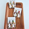 Shop Avery Drop Earrings - Multicolor-Avery Multicolor Drop Earrings with playful mix of soft blues, pinks, yellow, orange, black, and white. Lightweight, artistic, and full of fun personality.-available at Reef Love online boho-chic boutique