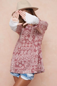 Aztec Print French Terry Top-Aztec print French terry top with thumb opening is a stylish and functional choice for your casual wardrobe. The Aztec print adds a vibrant, eye-catching touch.