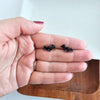 Shop Bat Studs - Black-Black bat stud earrings made from lightweight acrylic with hypoallergenic posts. The perfect spooky accessory for Halloween or fun everyday gothic style.-available at Reef Love online boho-chic boutique