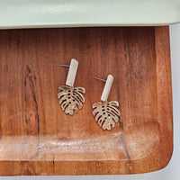 Shop Belize Earrings - Gold Monstera-Lightweight gold monstera leaf earrings with shimmery neutral acrylic studs. Tropical-inspired and hypoallergenic—perfect for everyday or resort-ready style.-available at Reef Love online boho-chic boutique
