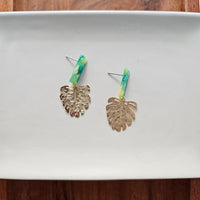 Shop Belize Earrings - Green with Gold Monstera-Mini green acrylic stud earrings with gold monstera charms. Lightweight, hypoallergenic, and full of tropical charm—perfect for everyday or vacation wear.-available at Reef Love online boho-chic boutique