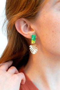 Shop Belize Earrings - Green with Gold Monstera-Mini green acrylic stud earrings with gold monstera charms. Lightweight, hypoallergenic, and full of tropical charm—perfect for everyday or vacation wear.-available at Reef Love online boho-chic boutique