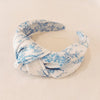 Blue And White Toile Knotted Headband-Blue And White Toile Knotted Headband Made from silky satin fabric, this headband features a classic blue and white toile print and a stylish knotted center detail.