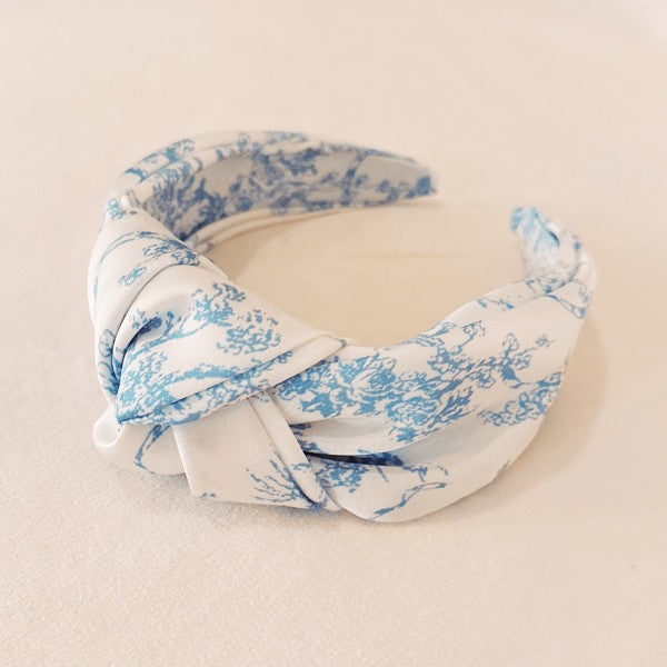 Blue And White Toile Knotted Headband-Blue And White Toile Knotted Headband Made from silky satin fabric, this headband features a classic blue and white toile print and a stylish knotted center detail.