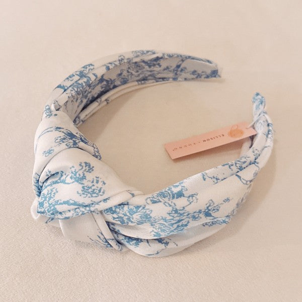 Blue And White Toile Knotted Headband-Blue And White Toile Knotted Headband Made from silky satin fabric, this headband features a classic blue and white toile print and a stylish knotted center detail.