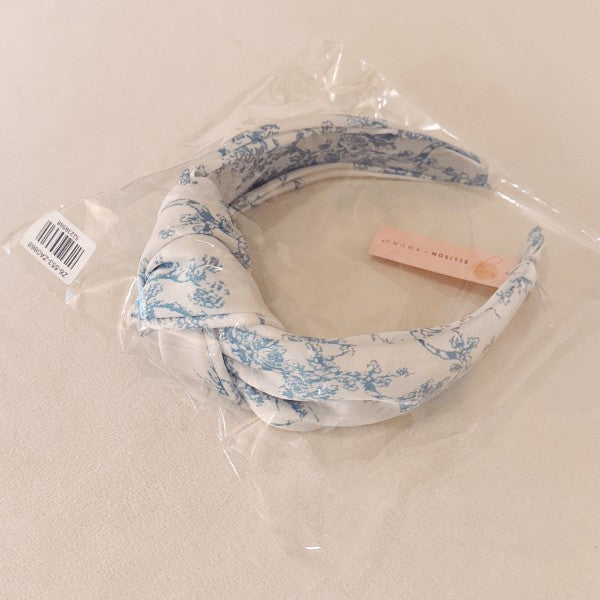 Blue And White Toile Knotted Headband-Blue And White Toile Knotted Headband Made from silky satin fabric, this headband features a classic blue and white toile print and a stylish knotted center detail.