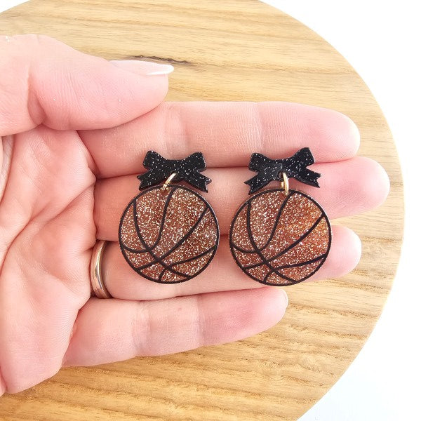 Bow Basketball Earrings-Dribble into game day style with our Game Day Bow Basketball Earrings - Whether you're courtside, couch-side, or just in it for the buzzer-beater drama.