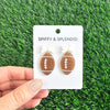 Bow Football Earrings-Football Season Must-have Earrings. Cheer in style with our Game Day Bow Football Earrings! Featuring a dainty white bow paired with a glittery brown football.