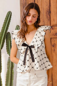 Bow Texture Jacquard Woven Blouse-Black and white jacquard woven blouse with bow tie, scallop trim, and V-neckline. Elegant fitted top for chic workwear or polished casual looks.-Reef Love
