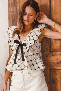 Bow Texture Jacquard Woven Blouse-Black and white jacquard woven blouse with bow tie, scallop trim, and V-neckline. Elegant fitted top for chic workwear or polished casual looks.-Reef Love