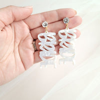 Shop Bride Earrings-Celebrate the bride-to-be with lightweight acrylic Bride earrings featuring zircon studs and gold-plated brass. Perfect for showers, photos, and parties.-available at Reef Love online boho-chic boutique